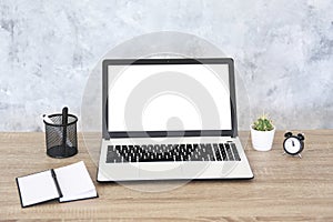 Minimalistic composition of workplace with laptop and stationery