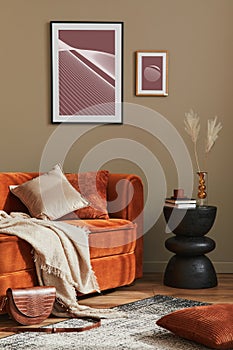 Minimalistic concept of stylish living room interior with design velvet ore sofa, mock up poster frame, stool, pillow, decoration.