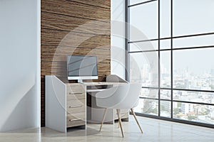 Minimalistic designer desktop with empty computer screen