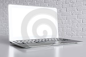 Minimalistic desktop with empty laptop