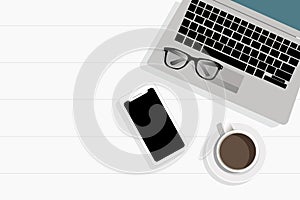 Minimalistic flat lay composition of black & white laptop computer keyboard, cell phone gadget, cup of coffee & folded glasses on