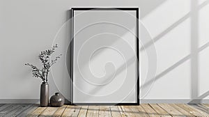 Minimalistic Mockup: Black Poster Frame on Light Wooden Floor for Your Empty Picture Frame Needs