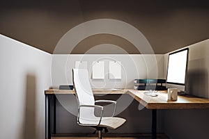 Minimalistic office with empty computer