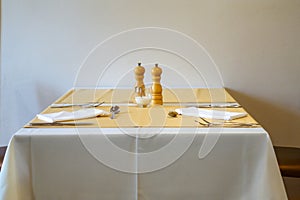 Minimalistic table in restaurant, copy space photo