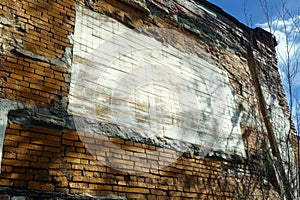 Minimalistic urban design blank poster on rustic brick wall