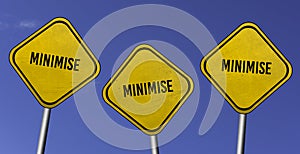 minimise - three yellow signs with blue sky background