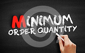 Minimum Order Quantity text on blackboard