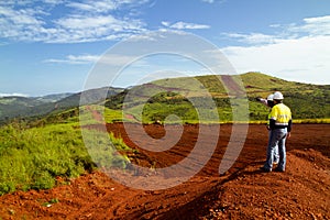 Mining construction workers on mountain top in Sierra Leone