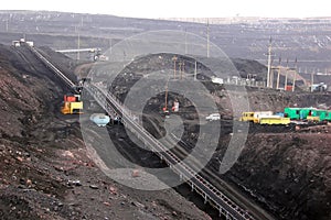 Mining, a conveyor system for transporting rock mass to the surface.