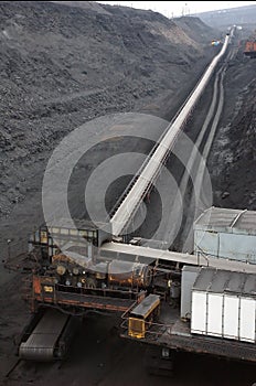 Mining, a conveyor system for transporting rock mass to the surface.