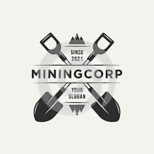 Mining corp and two crossed shovel vintage logo