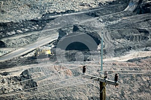 Mining dump trucks working in coalmine.