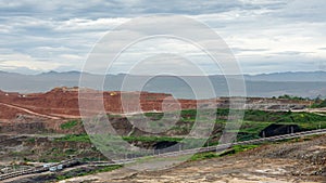 Mining dump trucks working in Lignite coalmine