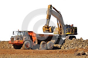 Mining excavator loading truck