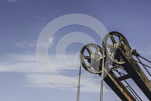 Mining machinery with two iron wheels with steel cable
