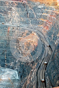 Mining trucks at the gold mine photo