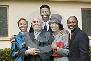 Minister with Family in church garden portrait