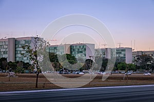 Ministry buildings at Esplanade of the Ministeries at sunset - government departments offices - Brasilia, Distrito Federal, Brazil