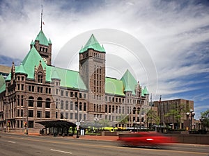 Minneapolis City Hall and moving car