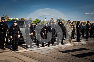 National guard and police standing off to control minneapolis riots