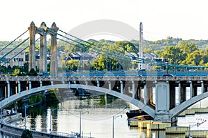 Minneapolis, MN, river and bridge near downtown buildings