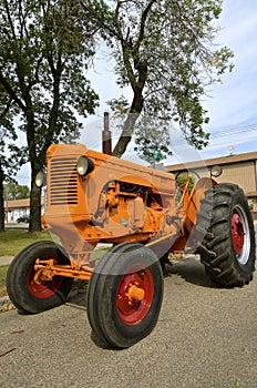 Minneapolis Moline tractor parked on Main Street