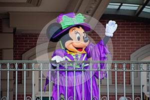 Minnie Mouse waving from the balcony at Walt Disney World Railroad in Halloween season at Magic Kingdom 13