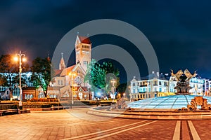 Minsk, Belarus. Night View Church Of Saints Simon And Helen Or Red Church