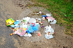 People throw away plastic bottles, bags and food waste, leave trash on the street after themselves