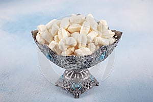 Mint candies. White mint sugar balls texture background. White mint imperials against