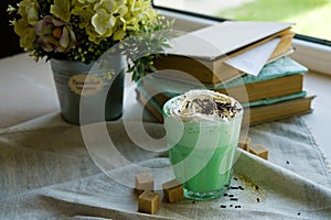 Mint coffee with with cream and colorful decoration. Milk shake, cocktaill, frappuccino. Unicorn coffee, unicorn food.