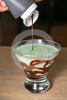 Mint Dessert Cocktail with Chocolate Sauce Drizzle