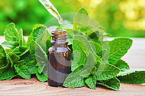 The mint extract in a small jar.