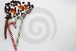Mint hard candy cane striped in Christmas colours isolated on a white background. Closeup