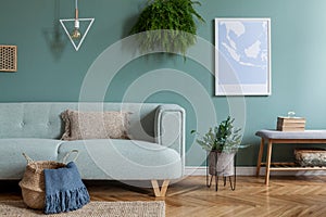 Mint sofa in stylish and cosy living room. photo