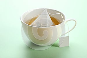 Mint tea bag in a cup