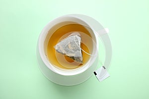 Mint tea bag in a cup