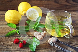 Mint tea with lemons and strawberries