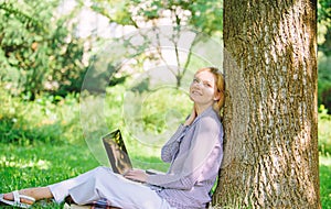 Minute for relax. Education technology and internet concept. Girl work with laptop in park sit on grass. Natural