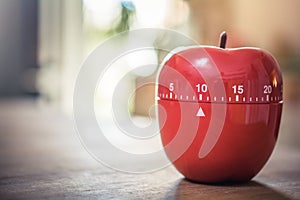 10 Minutes - Red Kitchen Egg Timer In Apple Shape On A Table