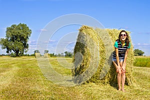 Minx girl on the sunny field.