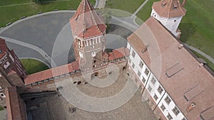 Mir Castle - an architectural masterpiece in the style of Belarusian Gothic, aerial shot. Beautiful old Belarus castle