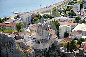 Mirabela Fortress (Peovica) in Omis, Croatia. Ruins of a hilltop fortress with views of the sea and the old town