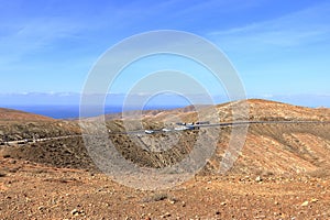 Mirador astronomico Sicasumbre, Fuerteventura, Spain - November 23 2023: People enjoy the view of the desert hills