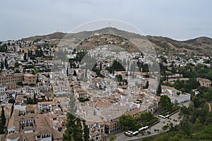 Mirador de San Nicols overlooking the Alhambra in Granada, Andalusia. We can also see the Pico Veleta photo