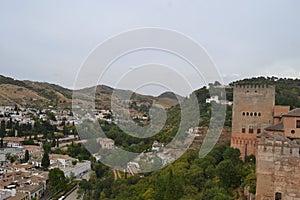 Mirador de San Nicols overlooking the Alhambra in Granada, Andalusia. We can also see the Pico Veleta photo