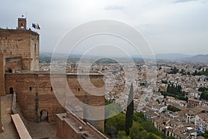 Mirador de San Nicols overlooking the Alhambra in Granada, Andalusia. We can also see the Pico Veleta photo