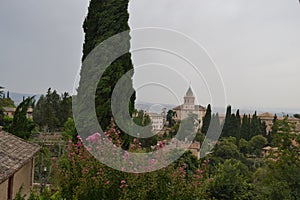 Mirador de San Nicols overlooking the Alhambra in Granada, Andalusia. We can also see the Pico Veleta photo