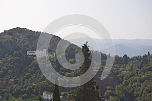 Mirador de San NicolÃÂ¡s overlooking the Alhambra in Granada, Andalusia. We can also see the Pico Veleta photo