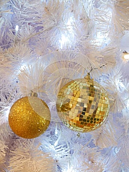 Mirror ball Christmas hanging decoration on light blue background